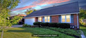 9715 W Wisconsin Ave in Wauwatosa wi. List Price: $499,000